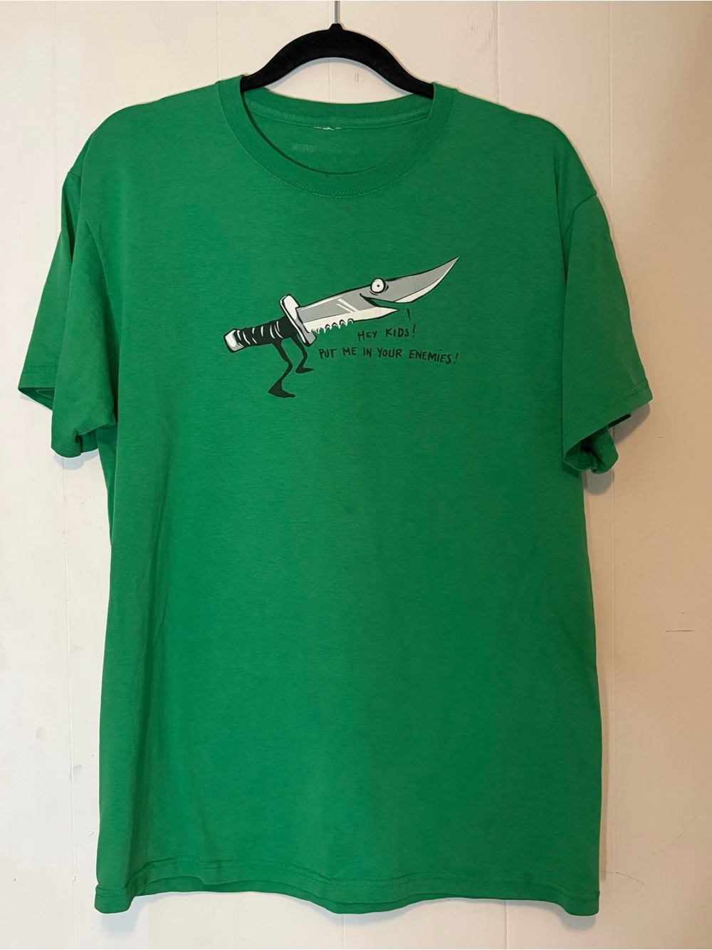 Green Graphic Crewneck T‑Shirt with Knife Illustration